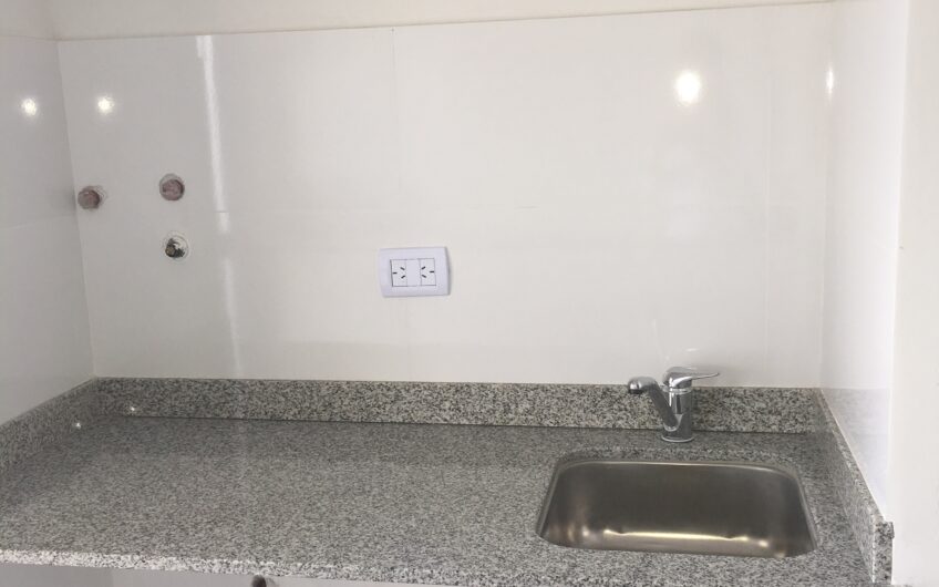 Departamento con Cochera y Terraza con Parrilla