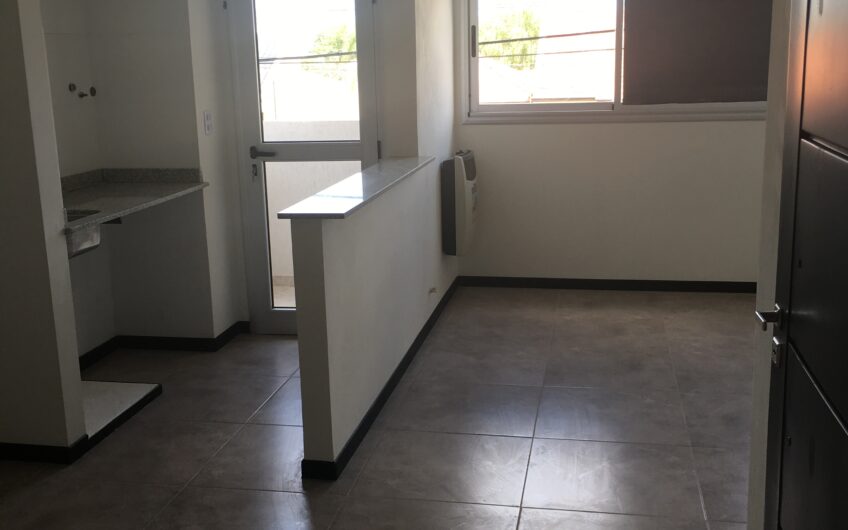 Departamento con Cochera y Terraza con Parrilla