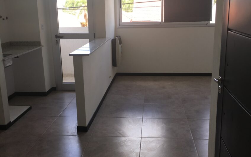 Departamento con Cochera y Terraza con Parrilla