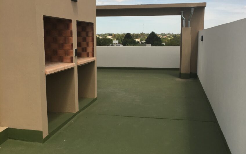 Departamento con Cochera y Terraza con Parrilla